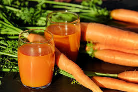 carrots and juice containing vitamin a