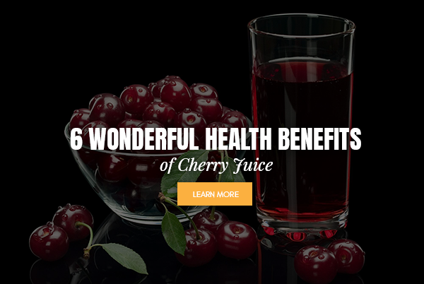 cherries in a bowl and glass of cherry juice