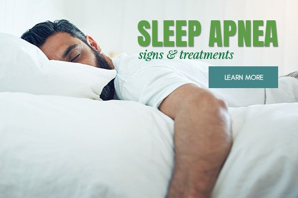 man sleeping on bed has sleep apnea